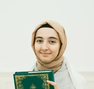 Muslim girl student learning Quran online
